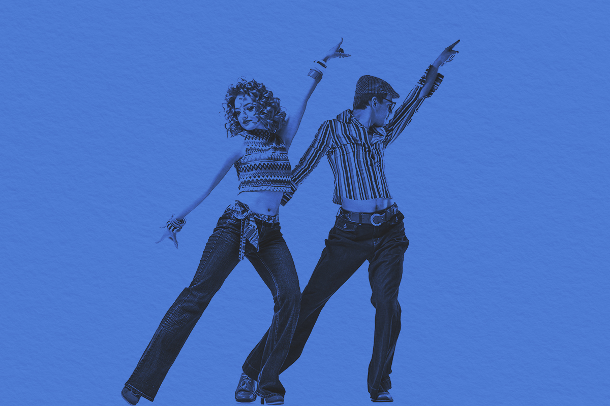 man and woman in retro style clothes dancing