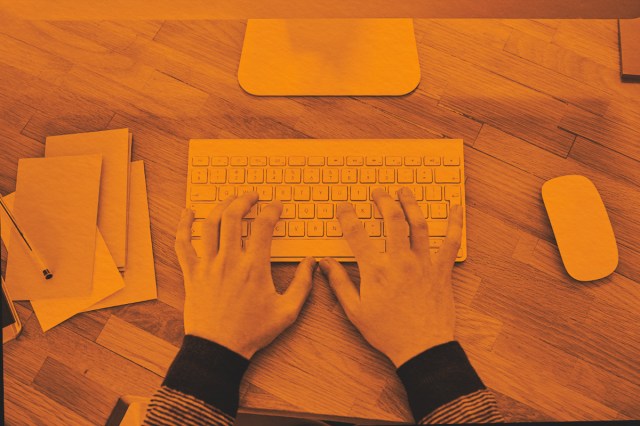 Top view, computer and hands typing in office