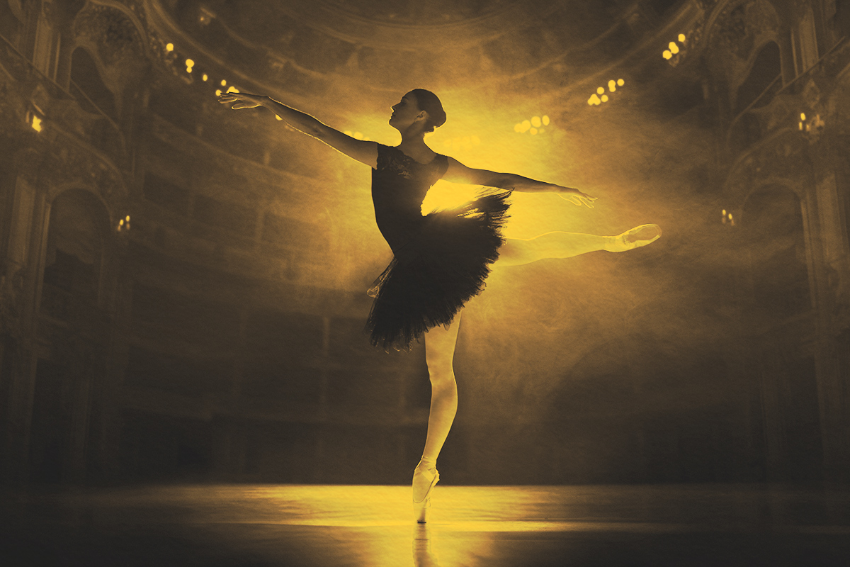 Professional ballet dancer in motion, performing on theater stage