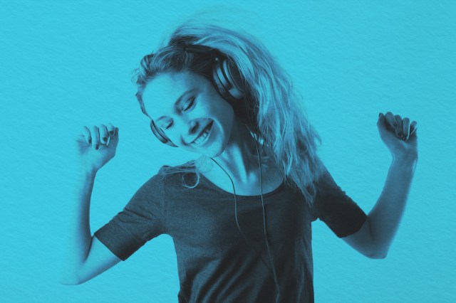 Woman Wearing Black Headphones