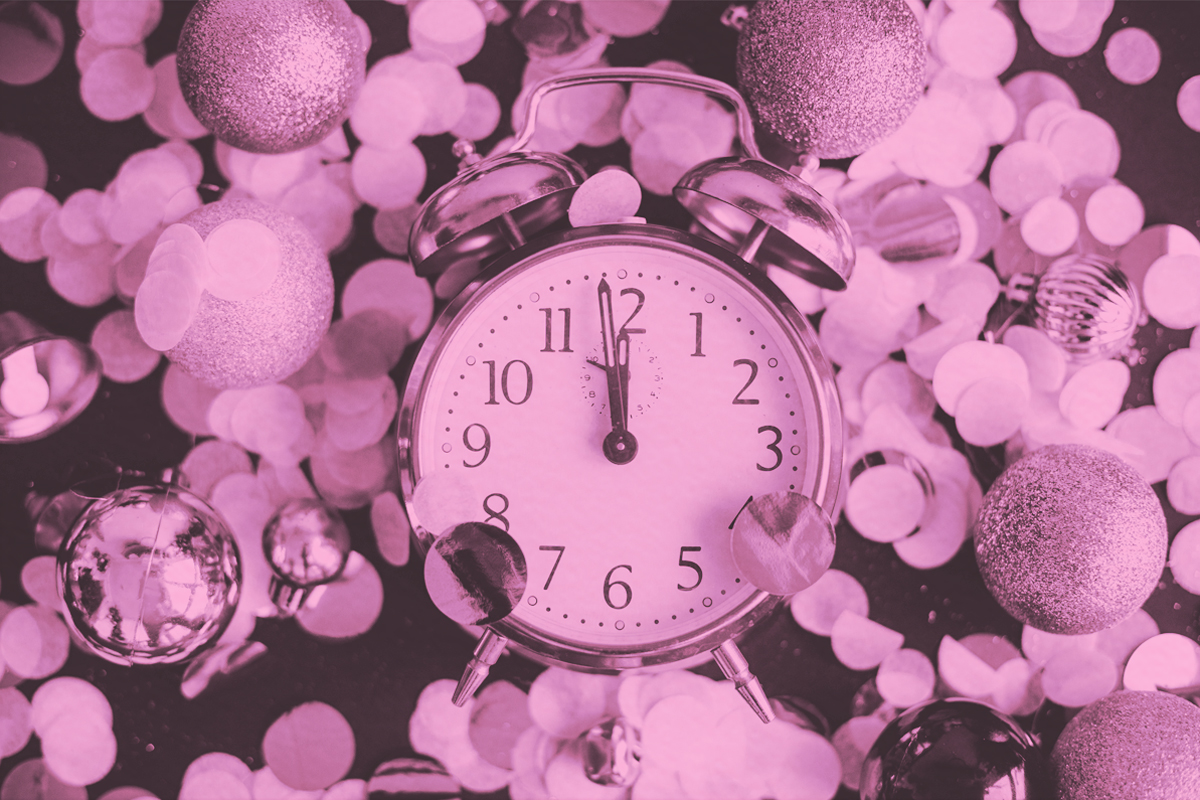 Clock, midnight, with golden confetti. New Year's Eve concept 