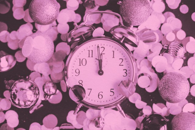 Clock, midnight, with golden confetti. New Year's Eve concept