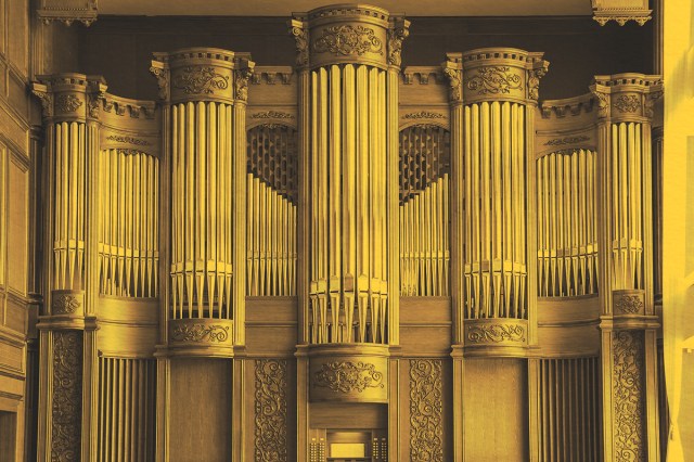 concert hall with a beautiful facade of a large pipe organ