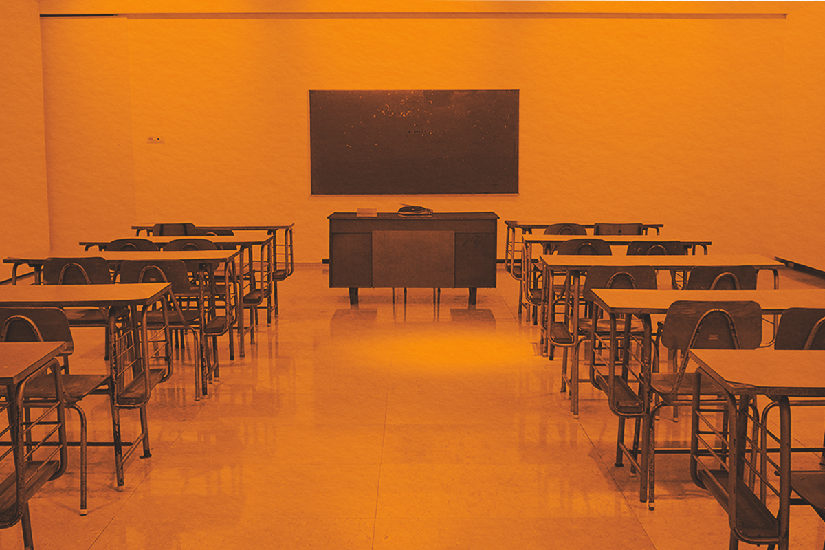 Chalkboard and chairs inside a classroom
