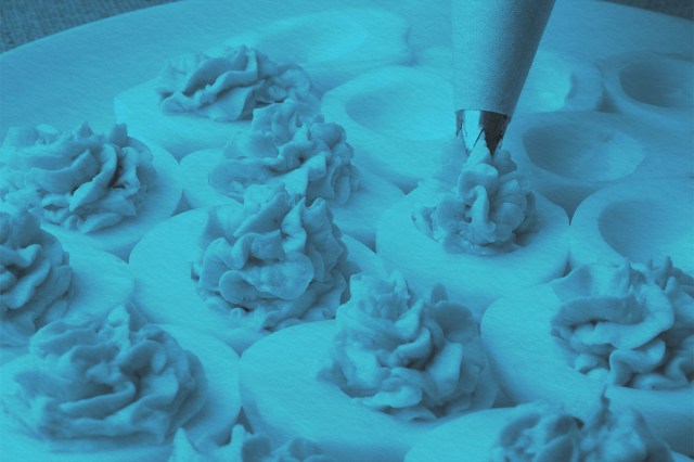 Piping being done for deviled eggs
