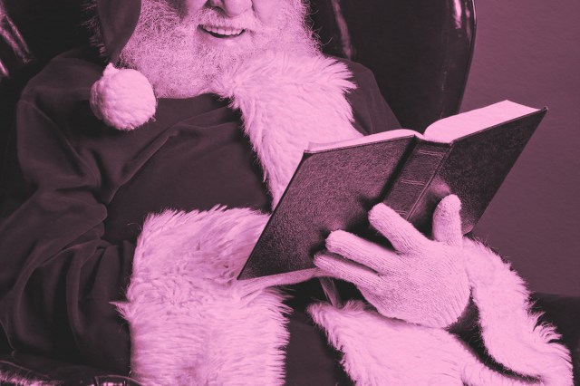 Santa Claus reading a book