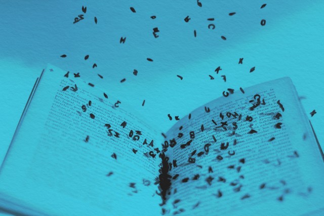 An open book on which black letters fall into it