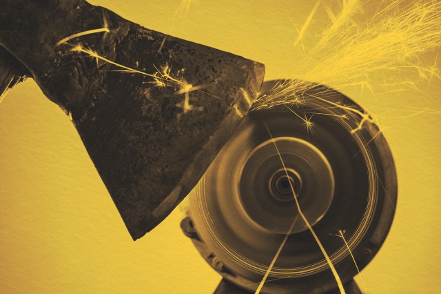 Close-up of axe sharpening