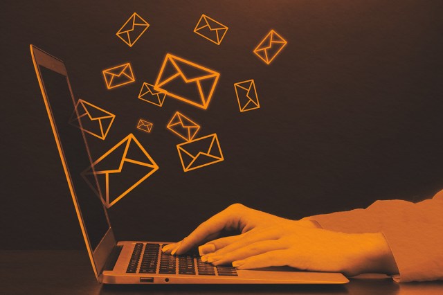 Typing on computer sending and receiving emails concept